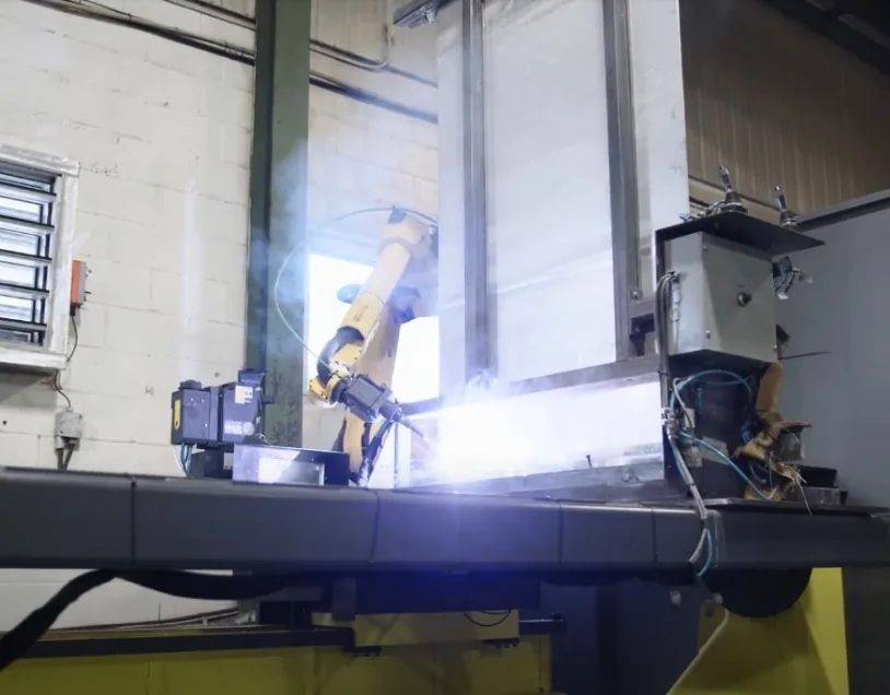 Robotic welding cell operating in the shop